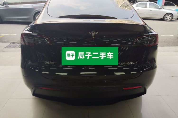Tesla Model Y 2024 #6 Tesla Model Y 2024 car image #6