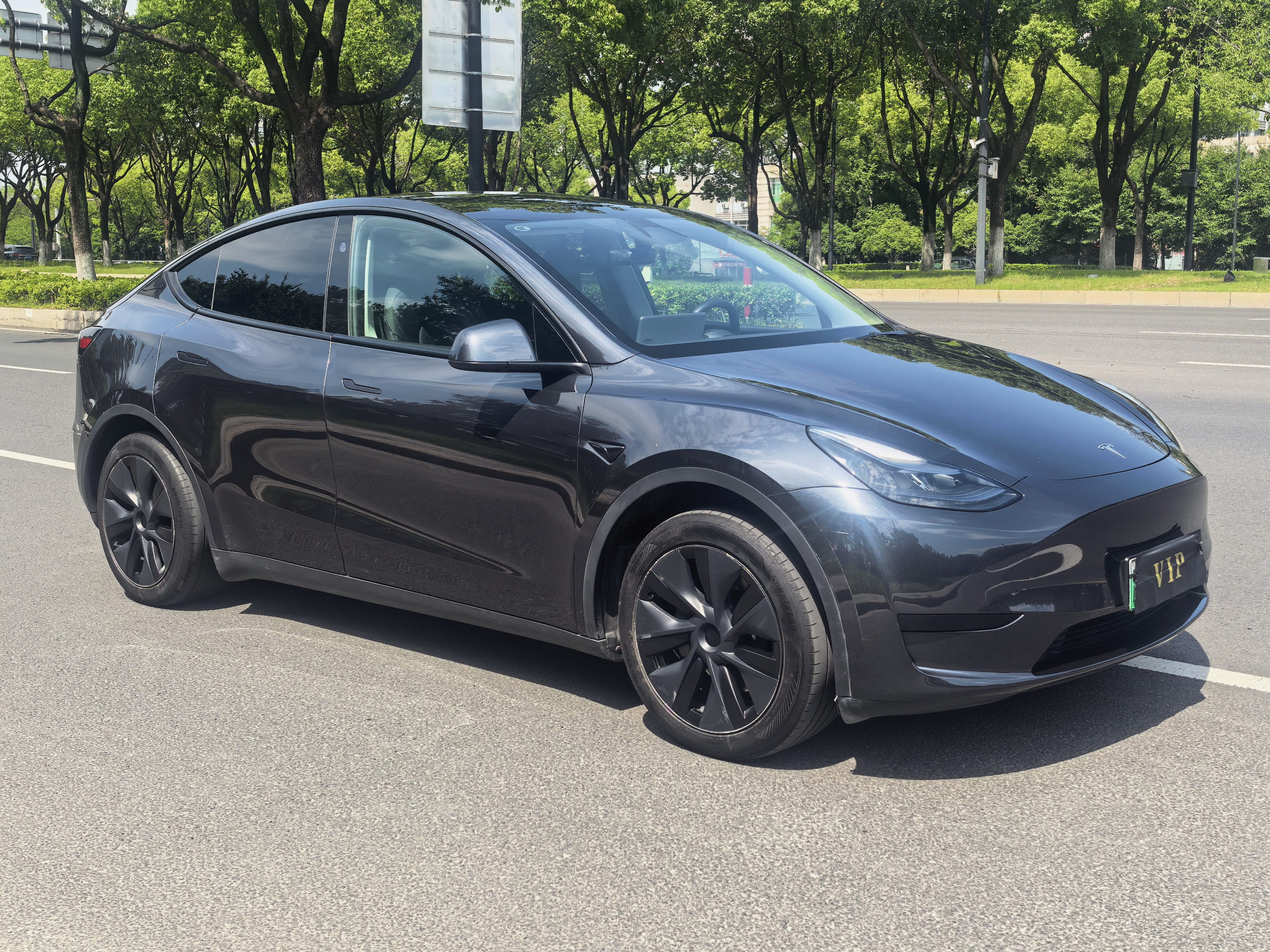 Tesla Model Y 2024 #3 Tesla Model Y 2024 car image #3