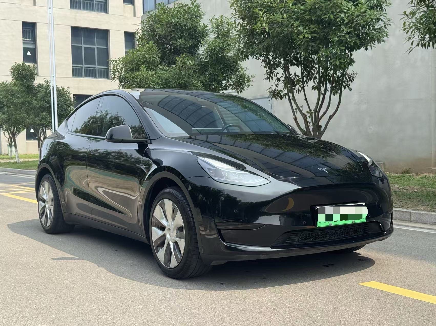 Tesla Model Y 2023 #5 Tesla Model Y 2023 car image #5