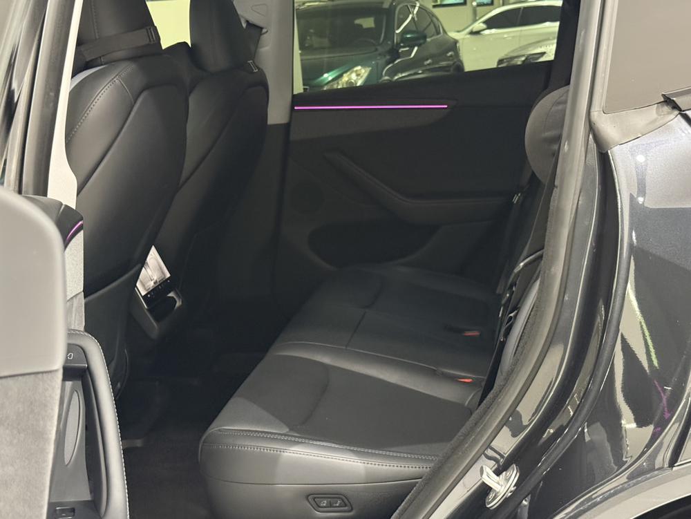 Tesla Model Y 2025 #16 Tesla Model Y 2025 car image #16