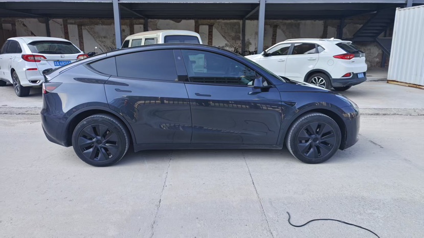 Tesla Model Y 2024 #6 Tesla Model Y 2024 car image #6