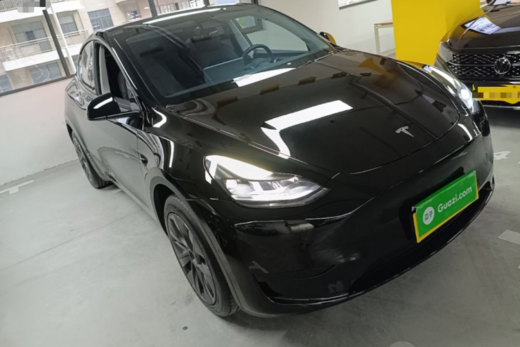 Tesla Model Y 2024 #4 Tesla Model Y 2024 car image #4