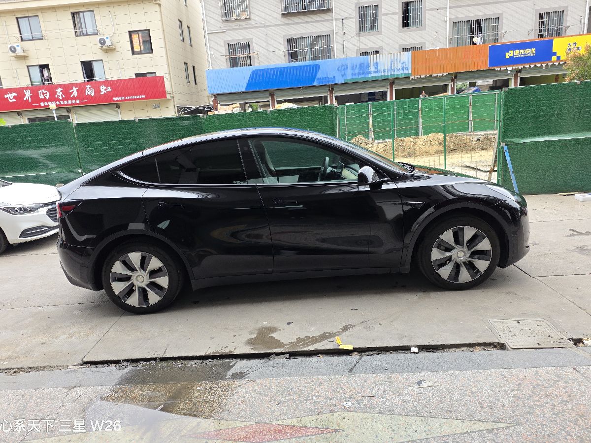 Tesla Model Y 2023 #5 Tesla Model Y 2023 car image #5