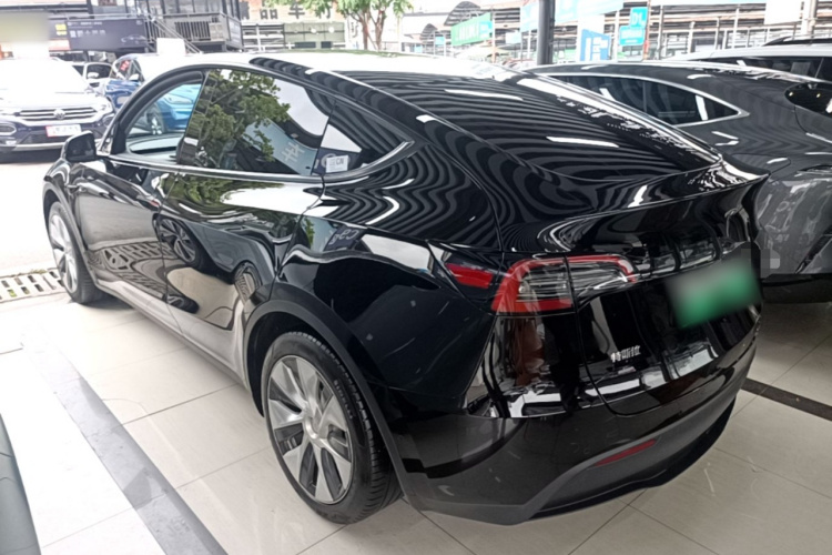 Tesla Model Y 2023 #5 Tesla Model Y 2023 car image #5