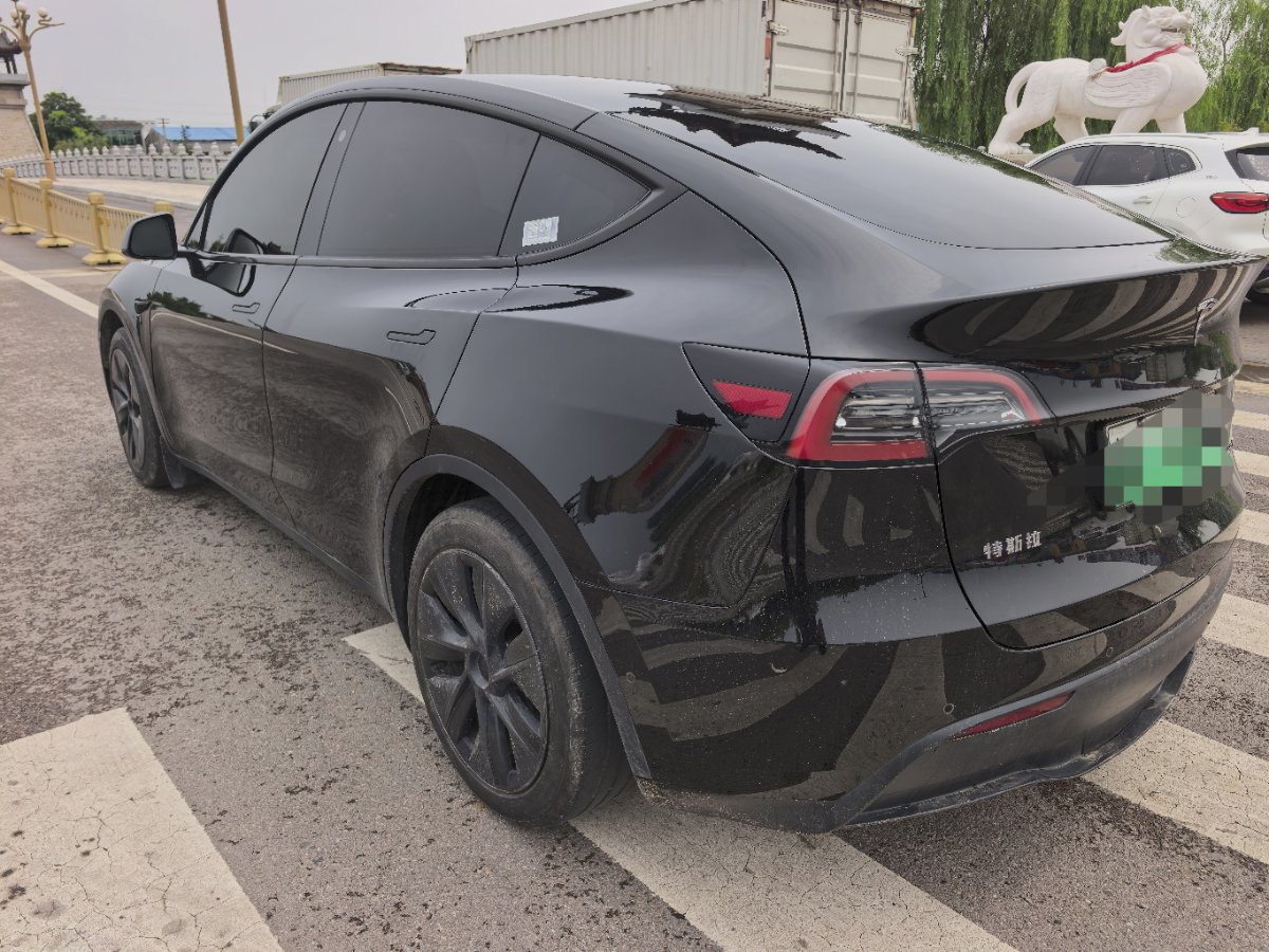 Tesla Model Y 2024 #3 Tesla Model Y 2024 car image #3