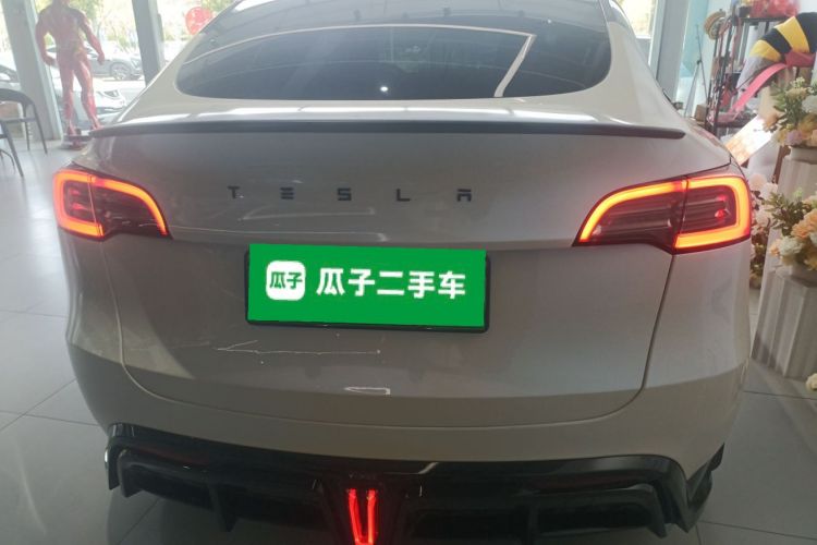 Tesla Model Y 2024 #4 Tesla Model Y 2024 car image #4