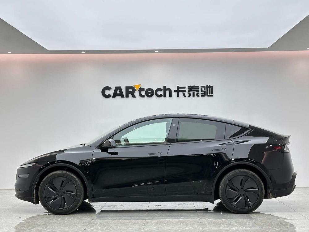 Tesla Model Y 2026 #4 Tesla Model Y 2026 изображение автомобиля #4