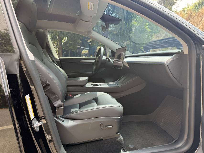 Tesla Model Y 2024 #7 Tesla Model Y 2024 car image #7