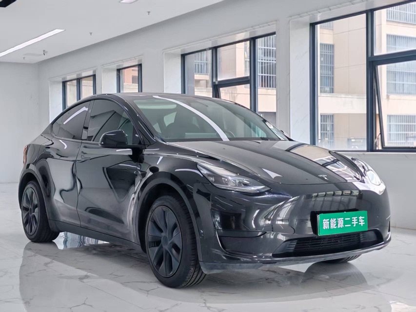 Tesla Model Y 2024 #3 Tesla Model Y 2024 car image #3