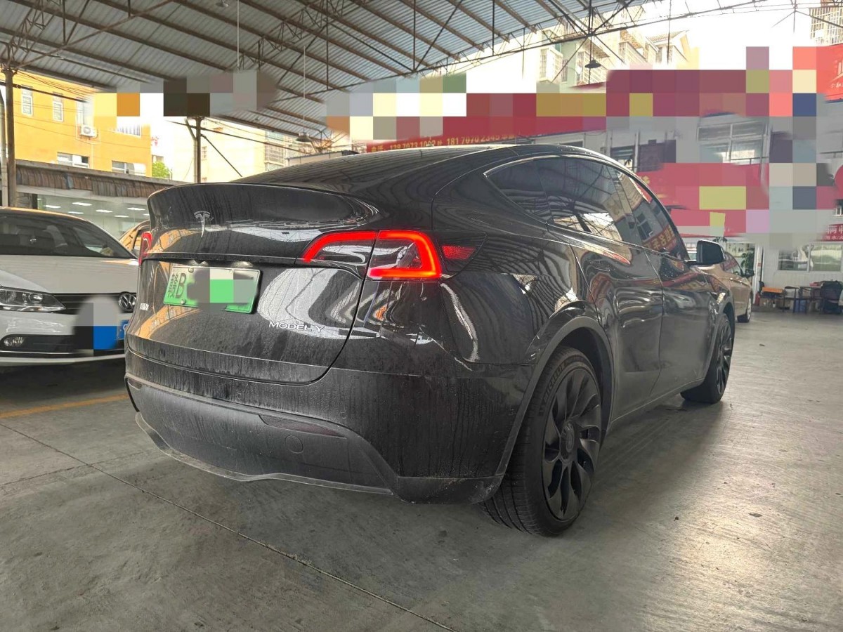 Tesla Model Y 2023 #4 Tesla Model Y 2023 car image #4