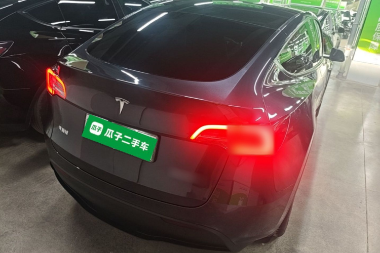 Tesla Model Y 2024 #7 Tesla Model Y 2024 car image #7