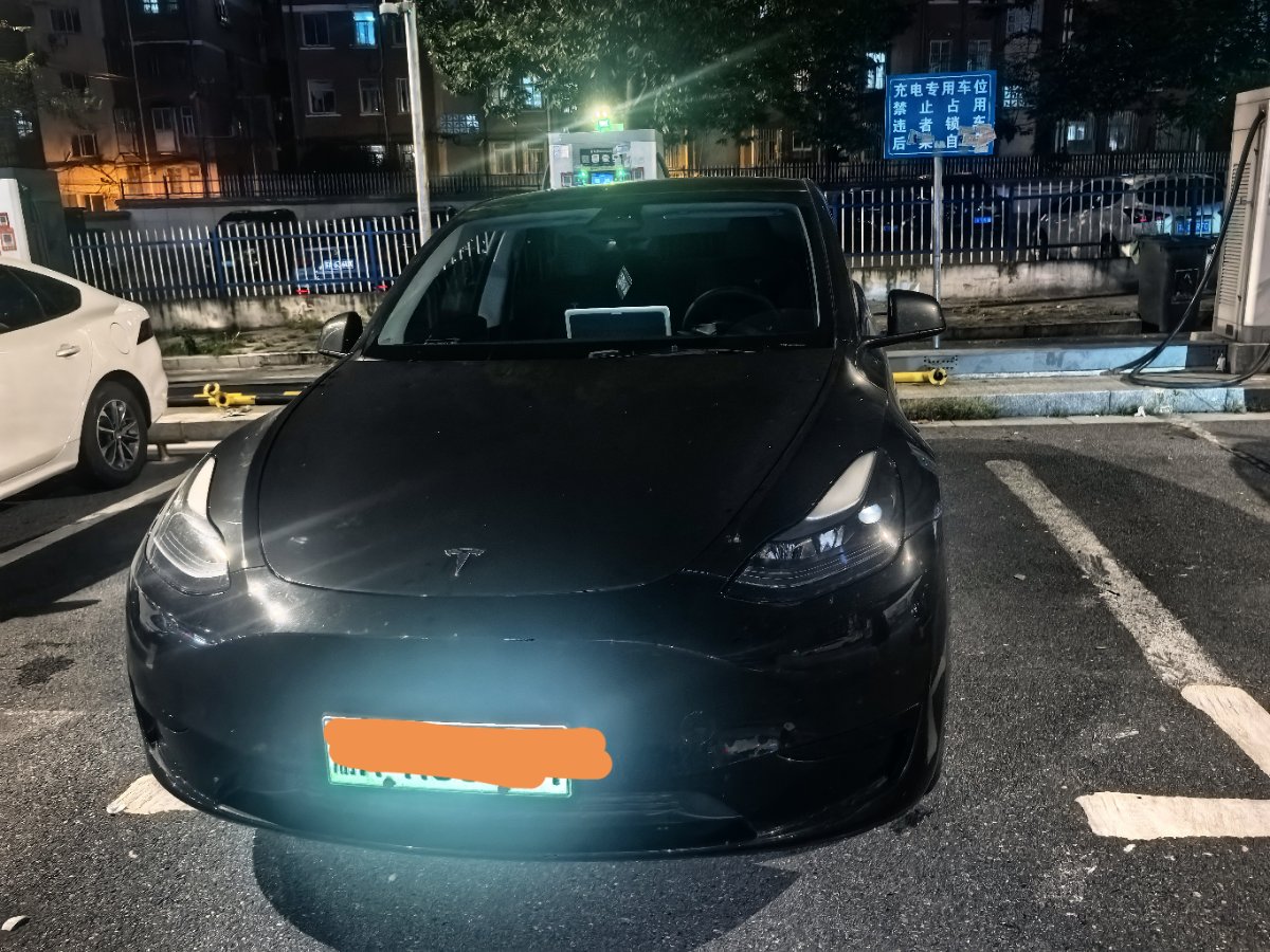 Tesla Model Y 2024 #2 Tesla Model Y 2024 car image #2