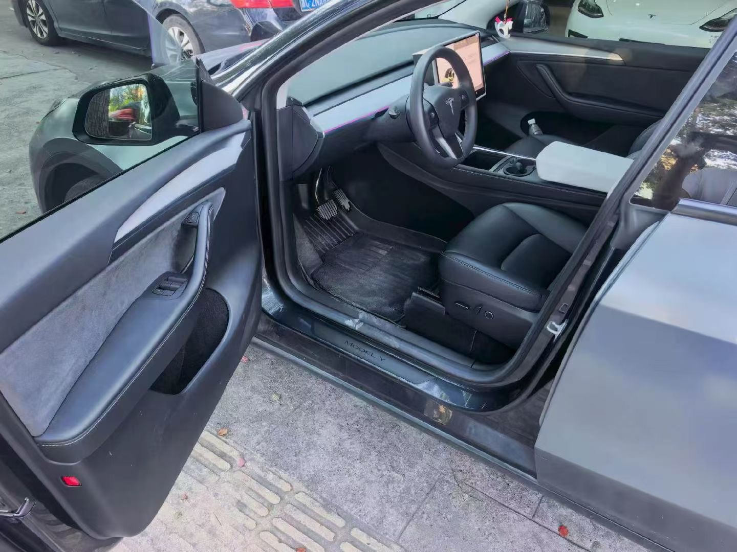 Tesla Model Y 2024 #6 Tesla Model Y 2024 car image #6