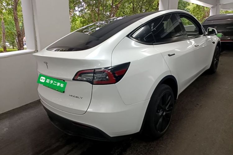 Tesla Model Y 2024 #7 Tesla Model Y 2024 car image #7