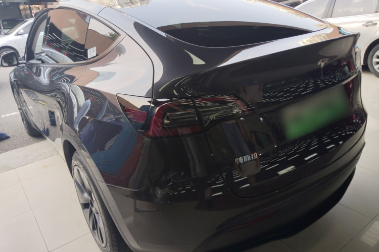 Tesla Model Y 2024 #5 Tesla Model Y 2024 car image #5