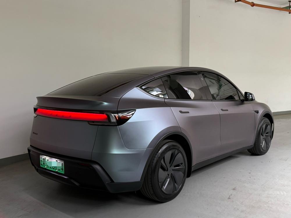 Tesla Model Y 2026 #5 Tesla Model Y 2026 car image #5