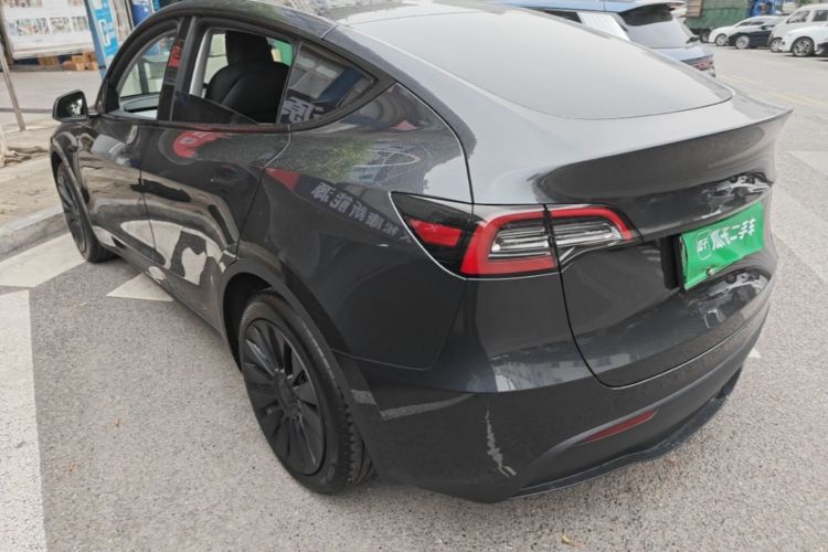 Tesla Model Y 2024 #5 Tesla Model Y 2024 car image #5