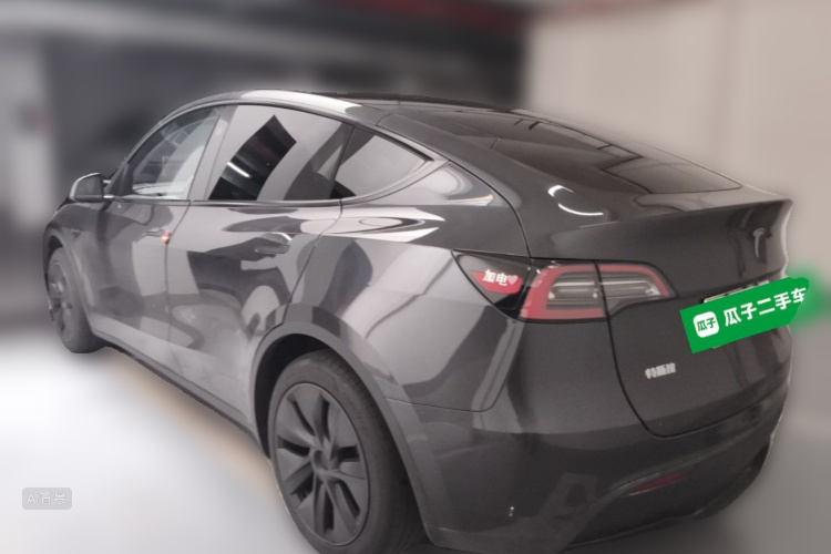Tesla Model Y 2024 #5 Tesla Model Y 2024 car image #5