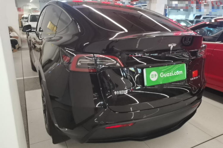 Tesla Model Y 2024 #5 Tesla Model Y 2024 car image #5