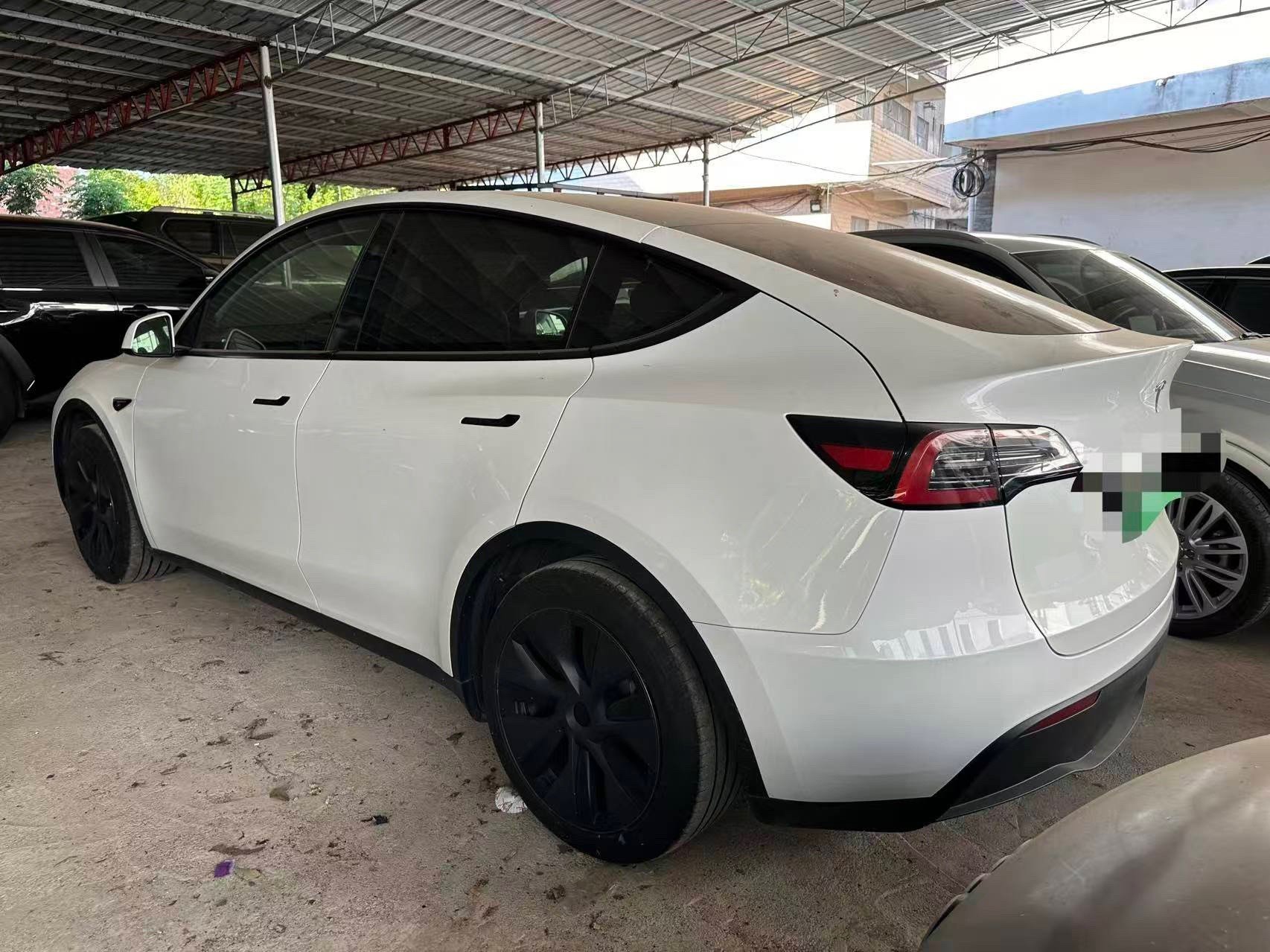 Tesla Model Y 2024 #3 Tesla Model Y 2024 car image #3