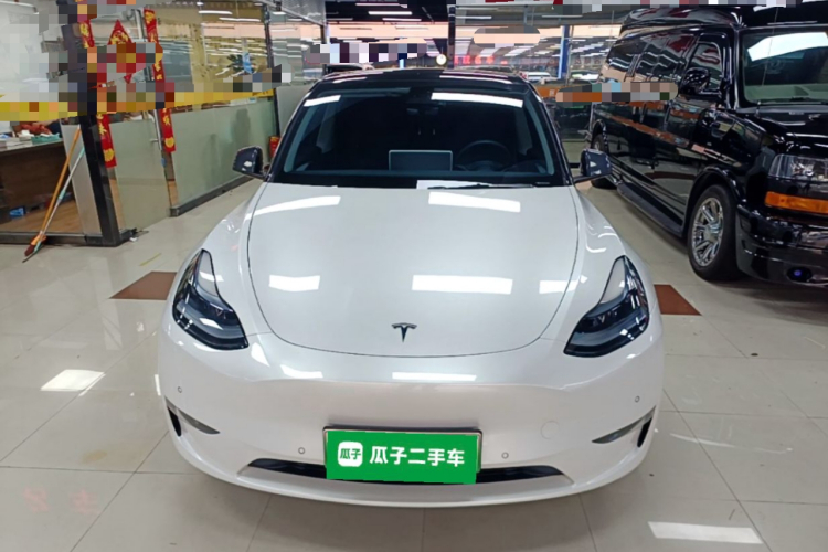 Tesla Model Y 2024 #3 Tesla Model Y 2024 car image #3