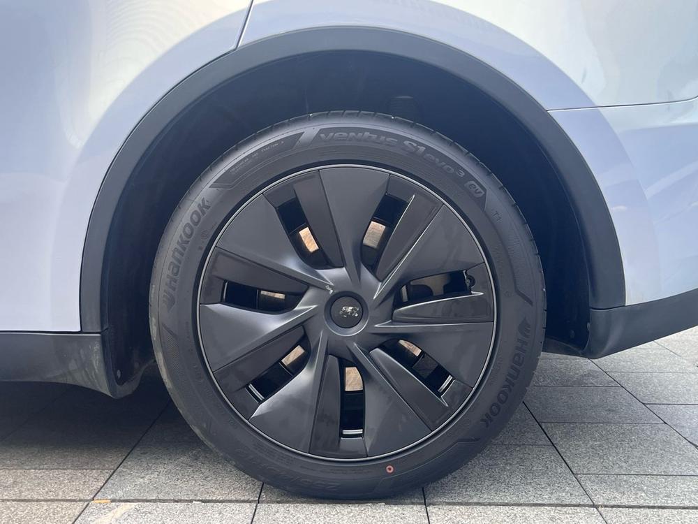 Tesla Model Y 2024 #7 Tesla Model Y 2024 car image #7