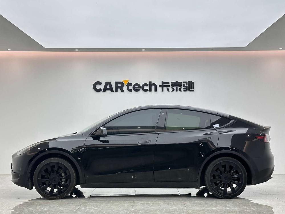 Tesla Model Y 2023 #4 Tesla Model Y 2023 car image #4