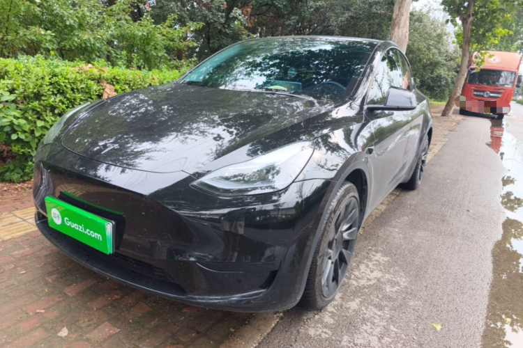 Tesla Model Y 2024 #2 Tesla Model Y 2024 car image #2