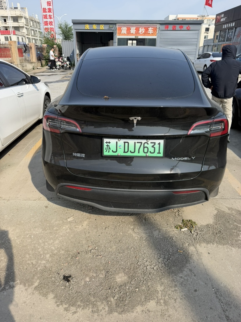 Tesla Model Y 2024 #5 Tesla Model Y 2024 car image #5