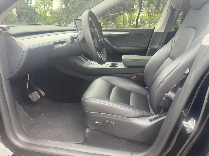 Tesla Model Y 2024 #6 Tesla Model Y 2024 car image #6