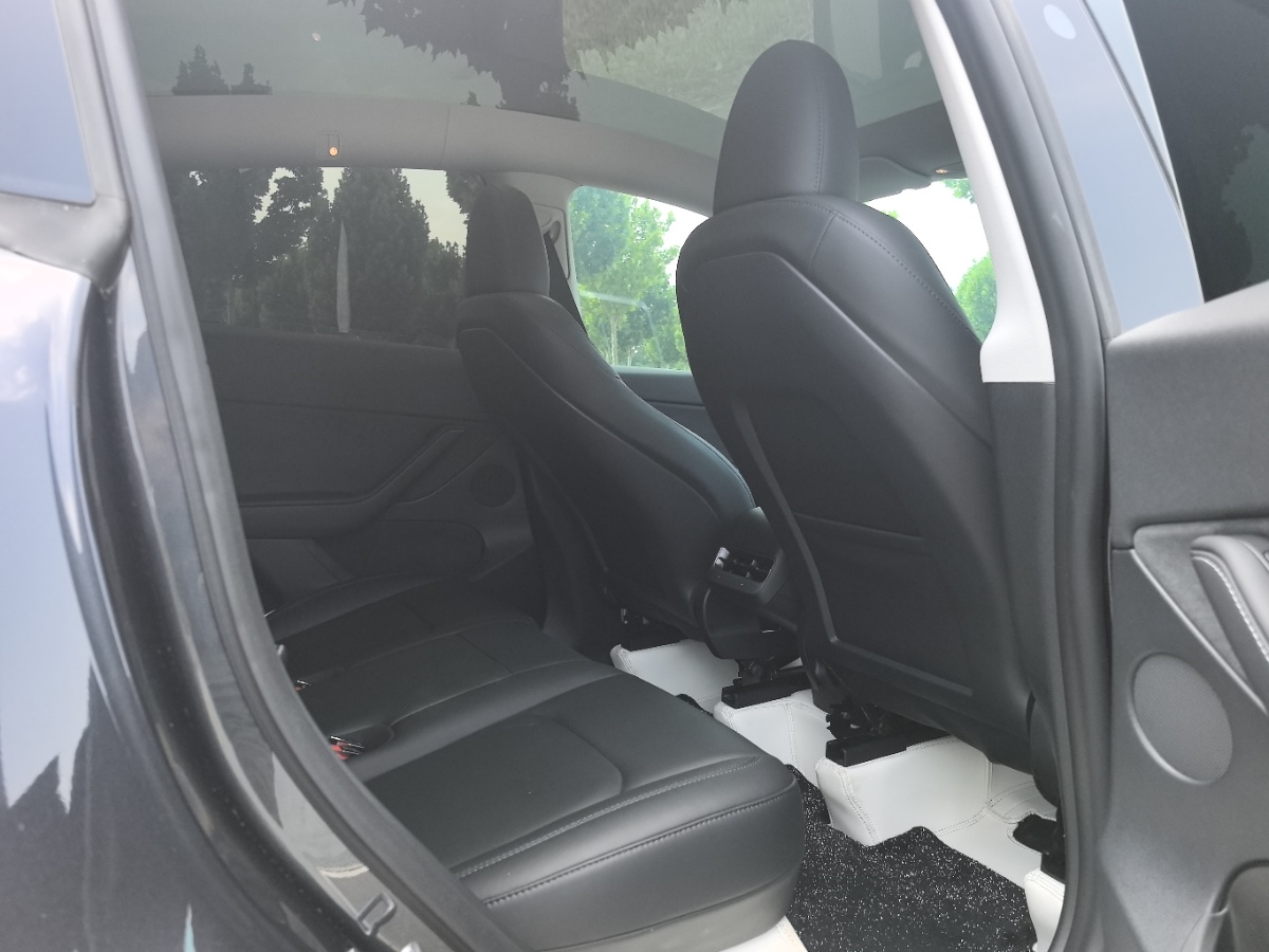 Tesla Model Y 2024 #6 Tesla Model Y 2024 car image #6