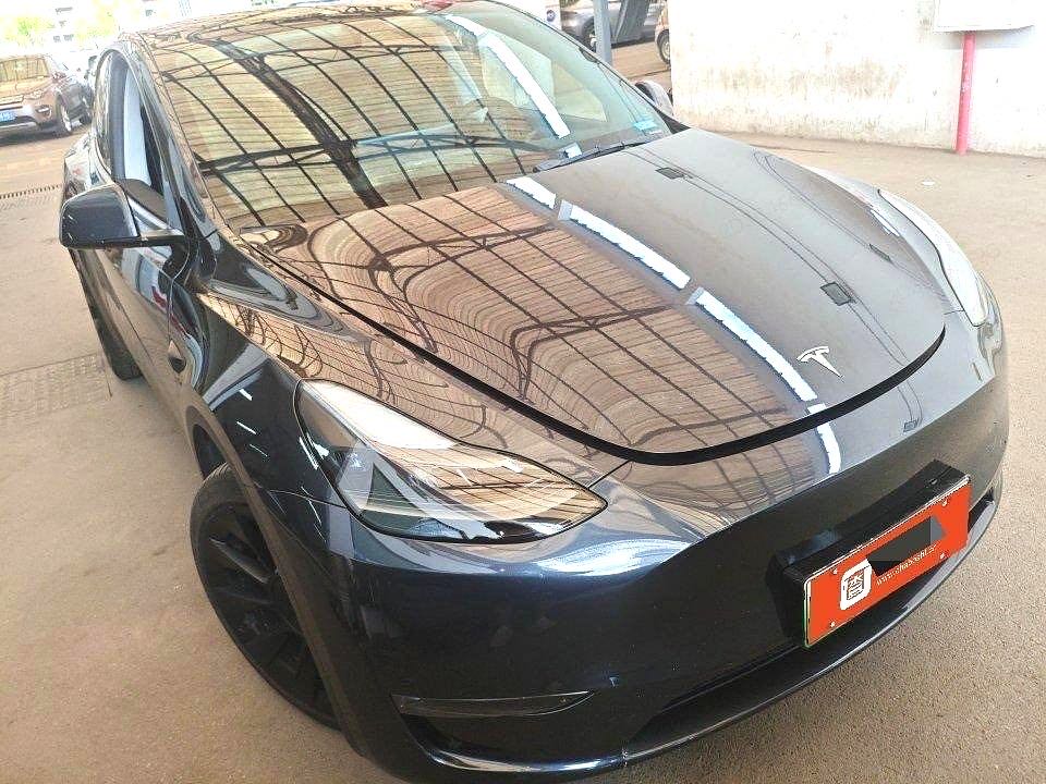 Tesla Model Y 2024 #4 Tesla Model Y 2024 car image #4