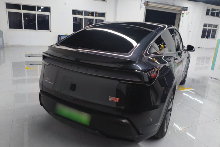 Tesla Model Y 2025 #7 Tesla Model Y 2025 car image #7