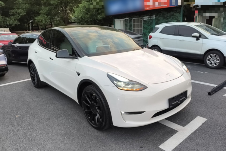 Tesla Model Y 2024 #4 Tesla Model Y 2024 car image #4