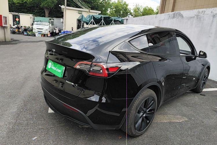 Tesla Model Y 2024 #7 Tesla Model Y 2024 car image #7