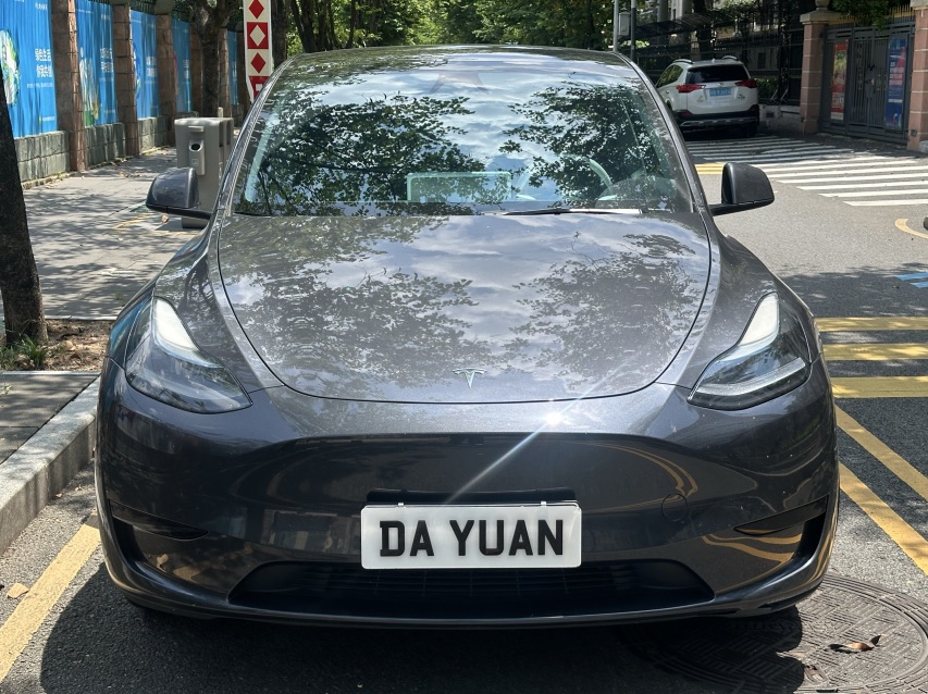 Tesla Model Y 2024 #2 Tesla Model Y 2024 car image #2