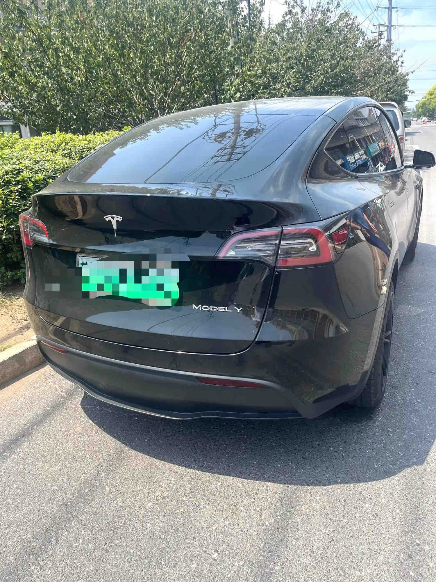 Tesla Model Y 2023 #4 Tesla Model Y 2023 صورة سيارة #4