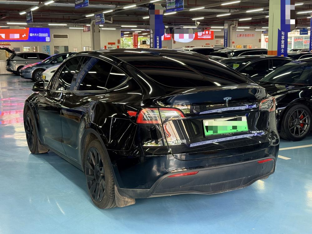 Tesla Model Y 2023 #4 Tesla Model Y 2023 car image #4
