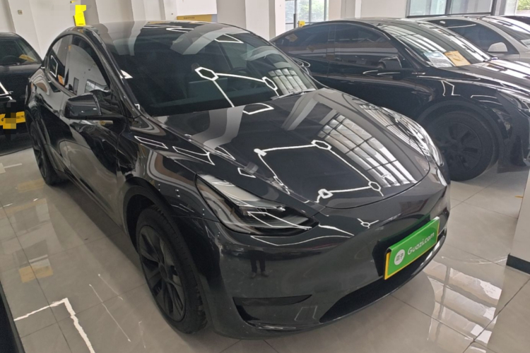 Tesla Model Y 2024 #4 Tesla Model Y 2024 car image #4