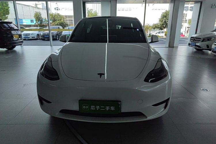 Tesla Model Y 2024 #3 Tesla Model Y 2024 car image #3