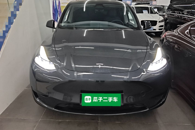 Tesla Model Y 2024 #3 Tesla Model Y 2024 car image #3