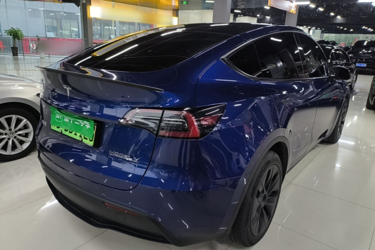 Tesla Model Y 2024 #7 Tesla Model Y 2024 car image #7