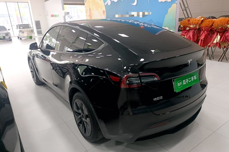 Tesla Model Y 2024 #7 Tesla Model Y 2024 car image #7