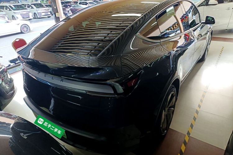 Tesla Model Y 2025 #7 Tesla Model Y 2025 car image #7