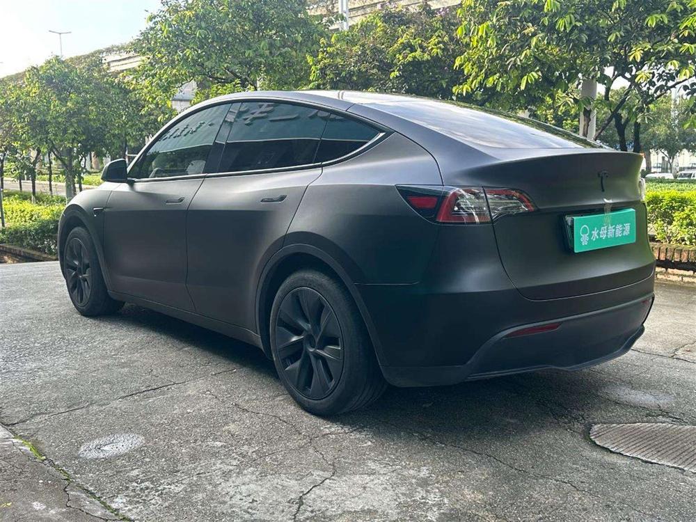 Tesla Model Y 2024 #5 Tesla Model Y 2024 car image #5