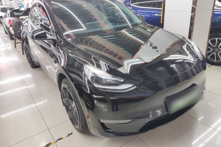 Tesla Model Y 2023 #4 Tesla Model Y 2023 car image #4