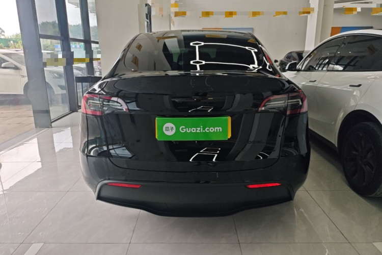 Tesla Model Y 2024 #6 Tesla Model Y 2024 car image #6