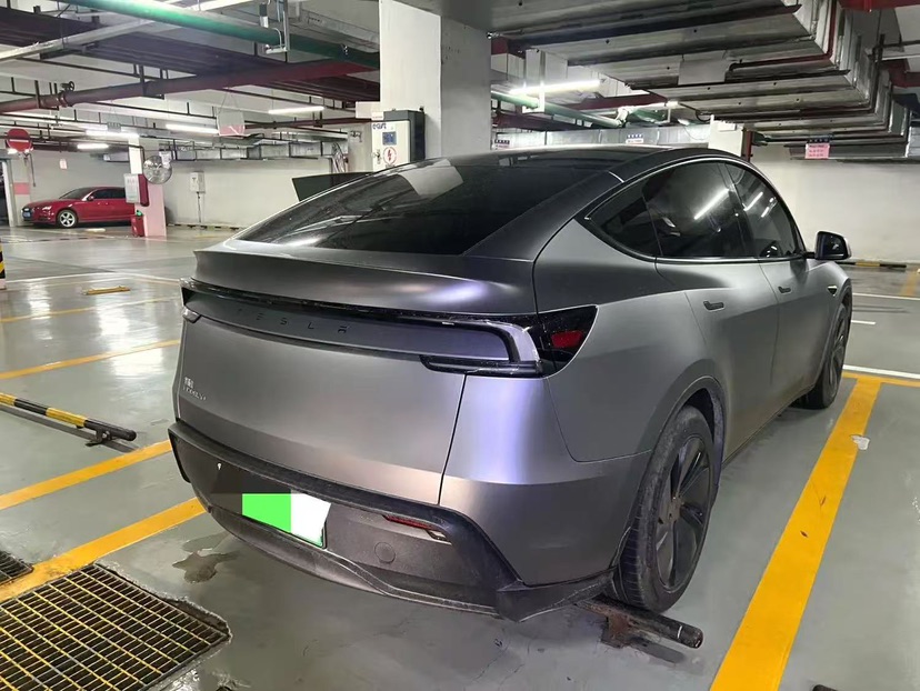 Tesla Model Y 2025 #5 Tesla Model Y 2025 car image #5