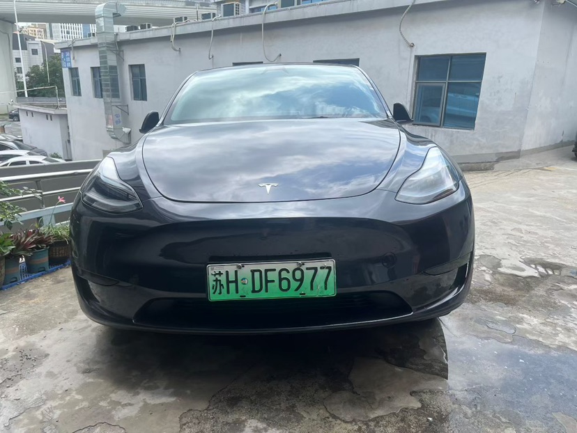 Tesla Model Y 2024 #2 Tesla Model Y 2024 car image #2