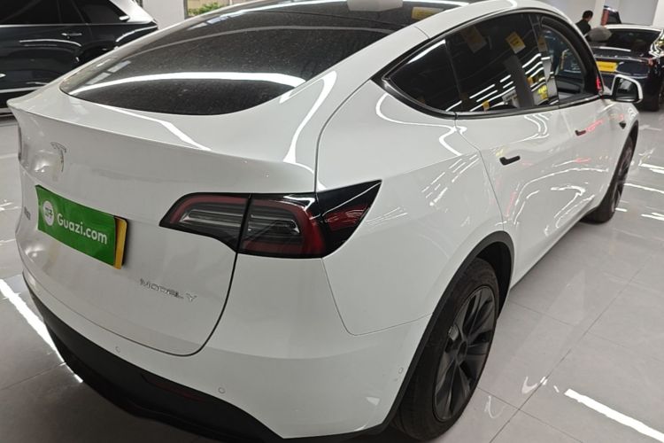 Tesla Model Y 2024 #7 Tesla Model Y 2024 car image #7